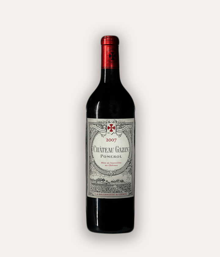 Weinflasche Château Gazin 2007 Pomerol – dunkle Bordeaux-Flasche mit roter Kapsel und Kreuz-Emblem, beiges Etikett mit ornamentaler Rahmung und Aufschrift Château Gazin Pomerol 2007