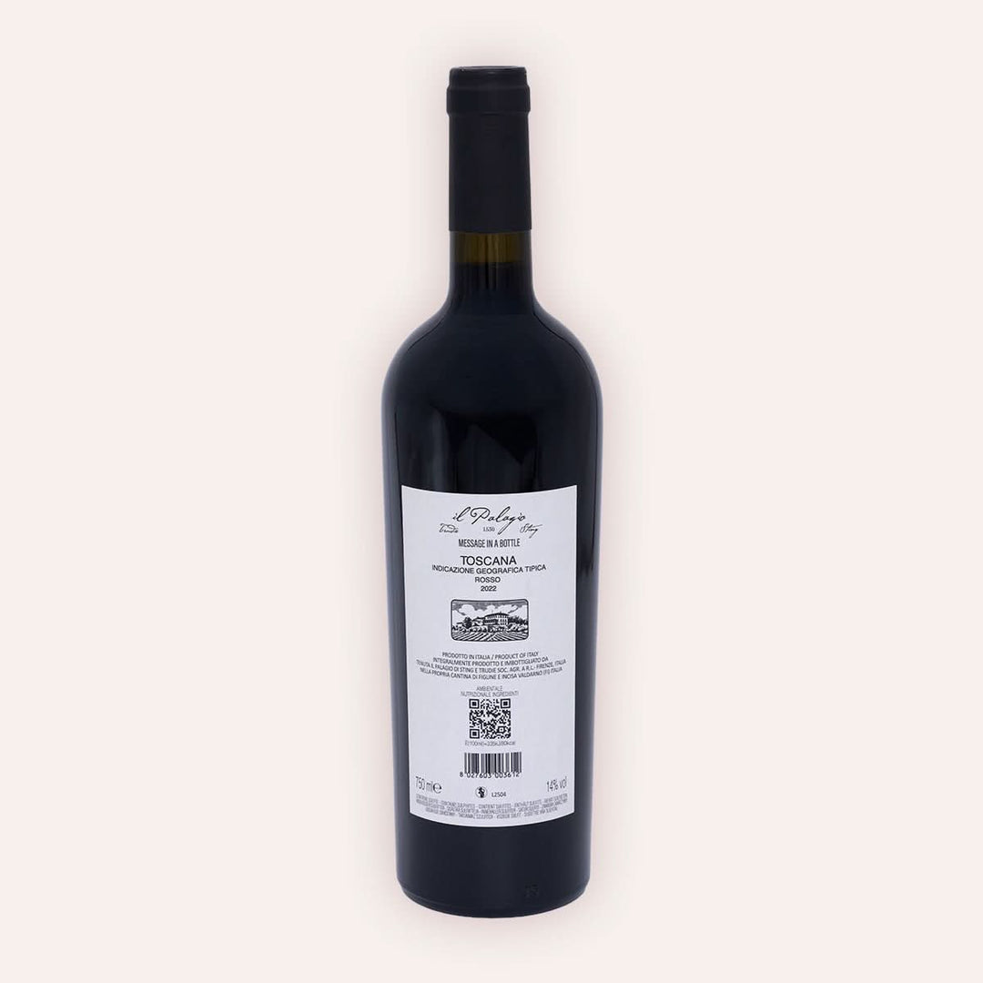 Rückseite der Weinflasche Tenuta Il Palagio | Sting – "Message in a Bottle" Rosso Toscana IGT 2022 – dunkle Flasche mit schwarzer Kapsel, graues Etikett mit Weinname und Il Palagio Aufschrift, Vino Biologico